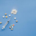 top view of syringe with pills
